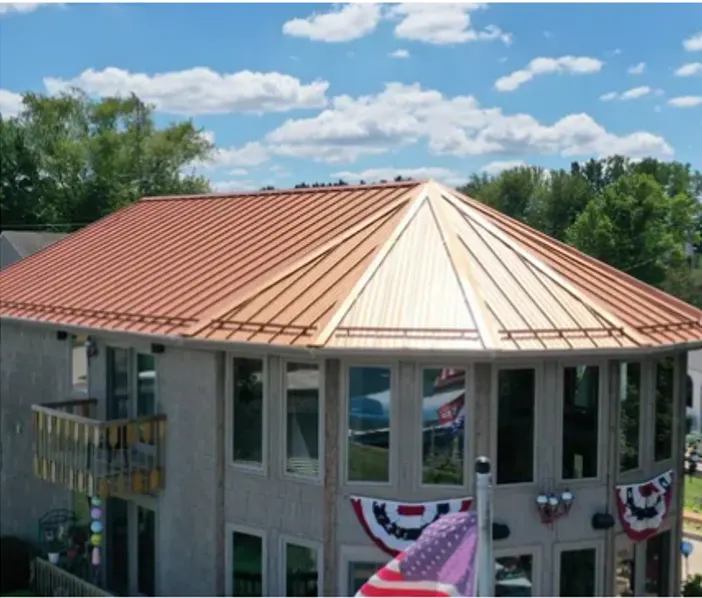 Tarping and dry-in on a Cicero commercial roof